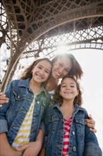 Hispanic family visiting Eiffel Tower