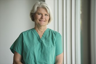 Caucasian surgeon in scrubs