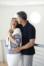 Caucasian couple laughing together