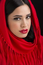 Glamorous Hispanic woman wearing headscarf