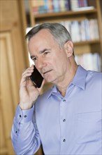 Caucasian businessman talking on cell phone