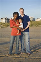 Multi-ethnic family enjoying beach