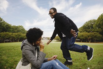Couple playing in park