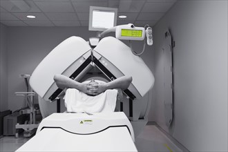 Caucasian man in CT scanner