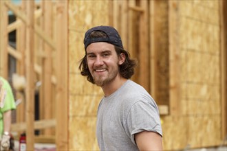Portrait of smile Caucasian man at construction site