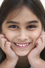 Close up of young girl smiling