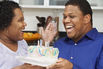 African couple celebrating birthday