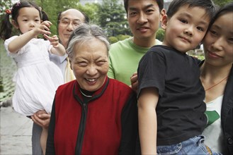 Portrait of multi-generational Asian family