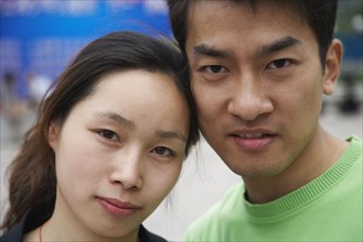 Close up of young Asian couple