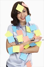 Woman covered in sticky notes