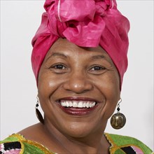 African American woman in pink headdress