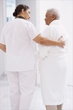 Nurse comforting Senior patient in hospital