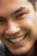 Close up of man's smiling face
