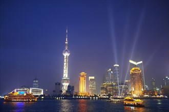 Shanghai city skyline lit up at night