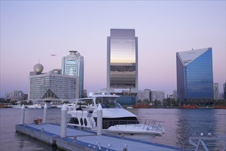 Yacht docked in urban bay