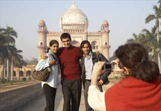 Indian family taking pictures by Safdarjang's Tomb