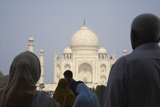 Tourists admiring Taj Mahal