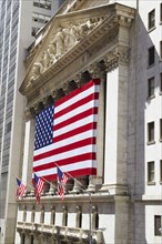 American flag hanging from New York Stock Exchange
