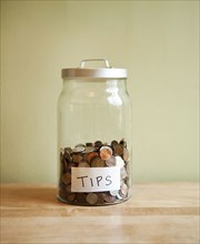 Coins in tip jar