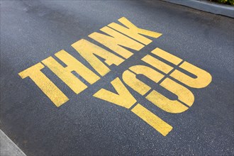 'Thank you' painted on concrete