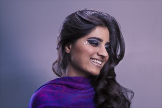 Close up of glamorous smiling Pakistani woman