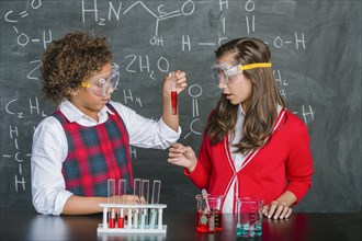 Students doing experiment in science class