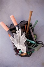 Close up of gardening tools in bucket