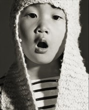Asian girl wearing knitted cap