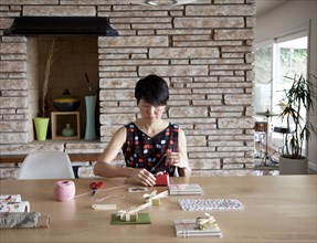 Japanese woman wrapping gifts
