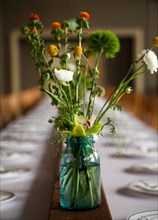 Bouquet of flowers on banquet table