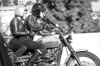 Blurred view of women riding motorcycle