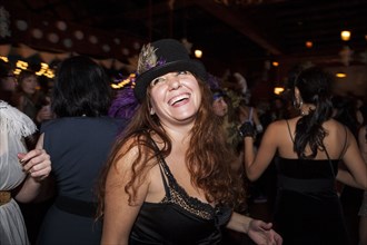 Laughing woman at party