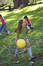 Children playing with ball in park