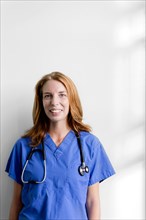 Smiling nurse wearing stethoscope