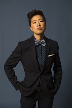 Androgynous woman wearing suit