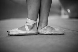 Ballet dancers wearing pointe shoes