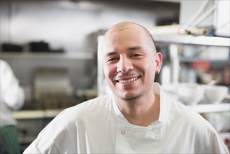 Hispanic male chef in kitchen