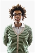 Mixed Race man wearing cardigan sweater
