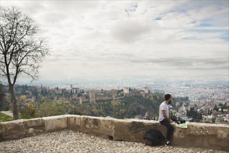 Man admiring scenic view of cityscape