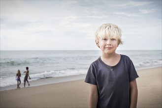 Boy smiling on beach