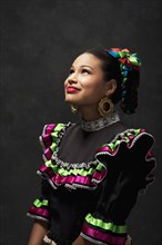 Hispanic teenage girl wearing Jallisco Folkloric dress