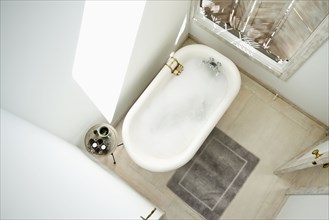 High angle view of bubble bath in bathroom
