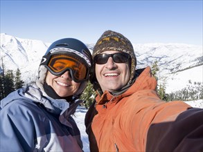 Smiling couple posing for selfie