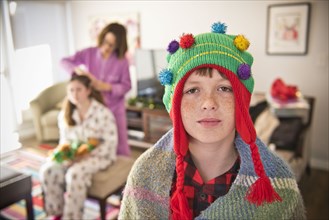 Portrait of Caucasian boy wearing Christmas tree stocking-cap