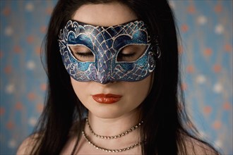 Middle Eastern woman in mask