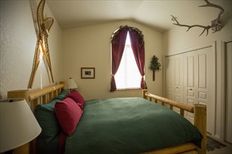 Bed in rustic bedroom