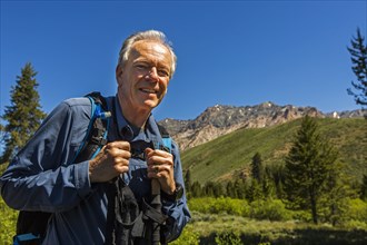Caucasian man hiking in mountains