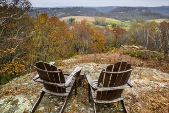 Adirondack chairs in rolling landscape