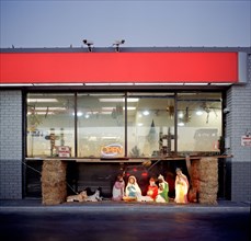 Christian nativity in front of store