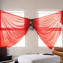 Unusual red curtains in living room